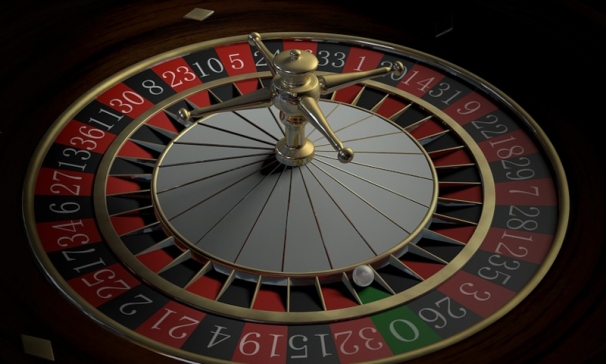 Roulette wiel met het balletje in de 0