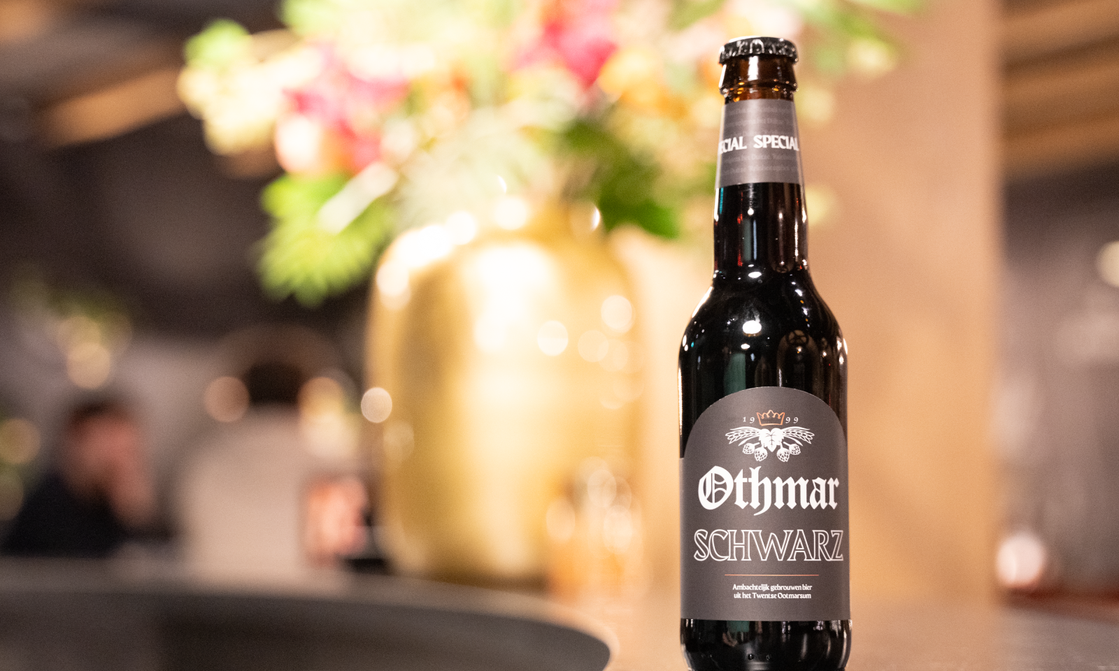 Othmar Schwarz flesje op de bar