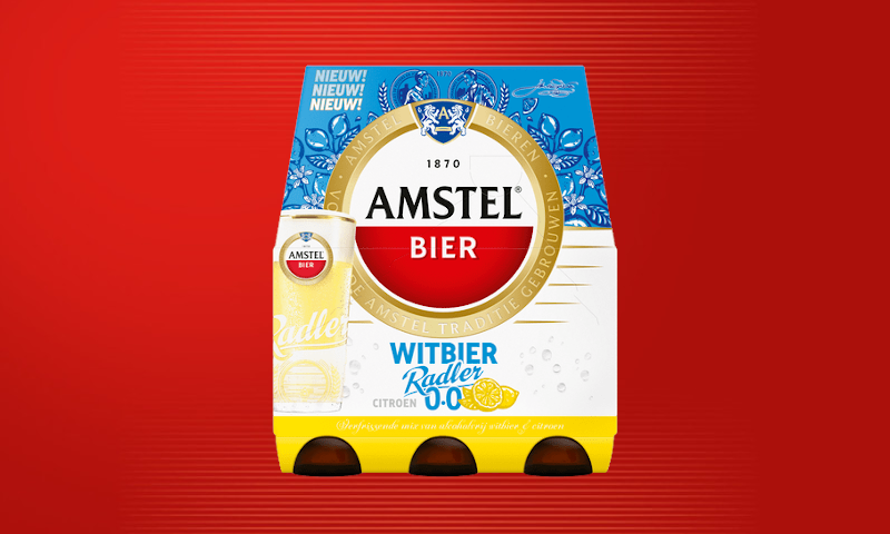 Amstel Witbier Radler 0.0% sixpack op rode achtergrond