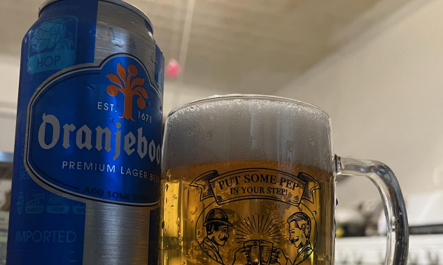 Oranjeboom blik en pul