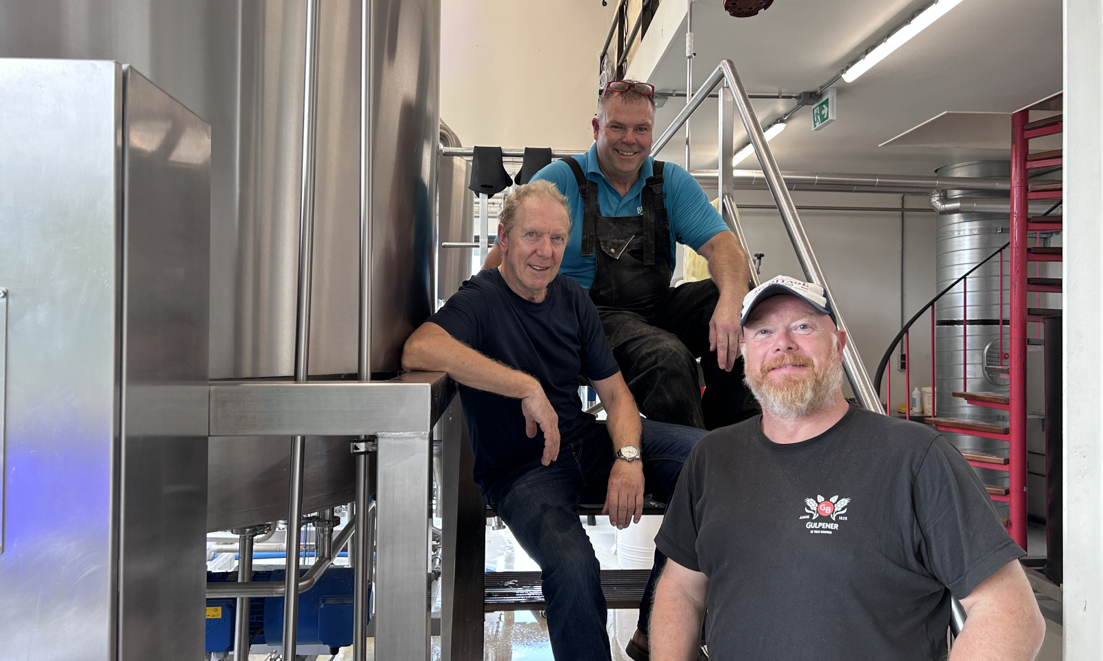 De drie initiatiefnemers voor het Goede Gast bier