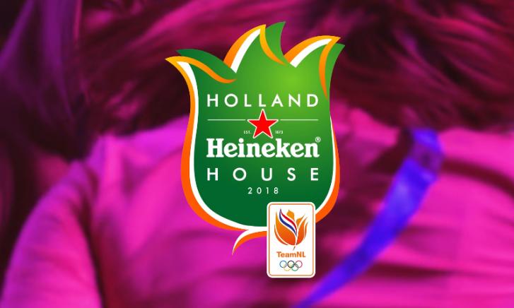 Vrouw in witte blouse, staand voor Heineken-logo met teksten in het Koreaans en Nederlands.